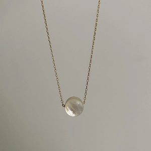 Elegant gold chain necklace with a round iridescent natural mother of pearl pendant