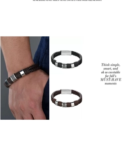 Detail view of woven leather bracelets for men with magnetic metal clasps and silver rings