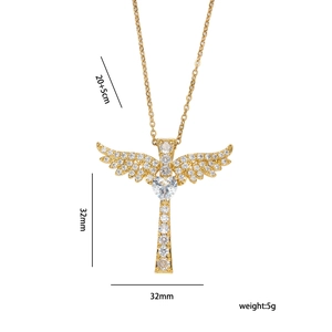 Gold angel wing cross necklace with sparkling zircon stones on a white background