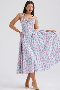Detail of light blue floral dress with halter neck and ruffled bodice design