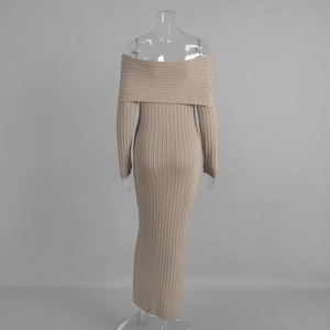 Close-up of beige off-shoulder knitted dress showing vertical ribbed texture and slim fit