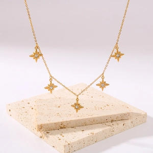 Elegant 18k gold plated stainless steel necklace with five zircon star pendants on stone