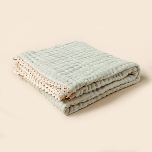 Soft mint 6-layer muslin cotton baby swaddle blanket with elegant beige lace trim edges