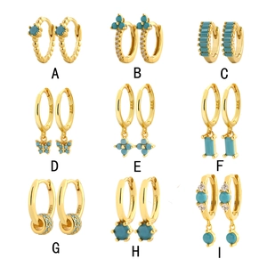 Luxury S925 sterling silver gold earrings set with turquoise stones and butterfly pendants