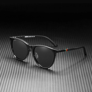 Detail of polarized sunglasses with red-green stripe temple and non-slip dotted design