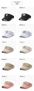 Detail view of five colors of embroidered sun visors in breathable knit fabric