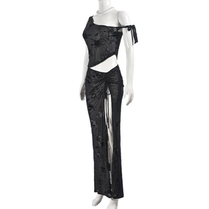 Detail of sheer black two-piece set featuring 3D floral texture and side drawstring
