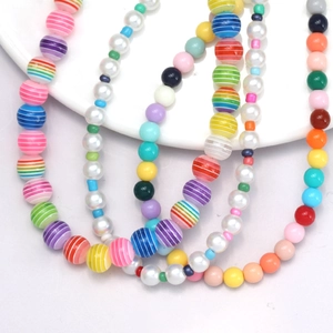 Turkish Evil Eye beaded phone chain with colorful striped beads and imitation pearls