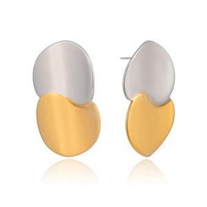 Detail of irregular geometric stud earrings featuring mixed silver and 18K gold tones