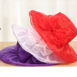 Three elegant organza sun hats in red, white, and purple with large decorative bows