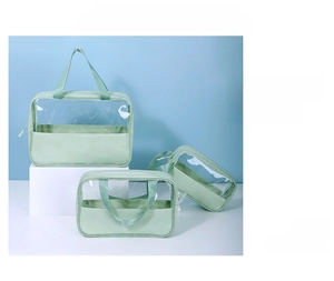 Three transparent green waterproof PVC cosmetic bags in various sizes for travel