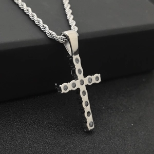 Hip hop silver stainless steel cross pendant necklace with black stones on a black box