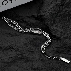 Silver double-layer Cuban and snake chain bracelet with a rectangular crystal pendant