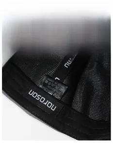 Close-up of baseball cap interior showing wide sweatband and 80% terylene material label