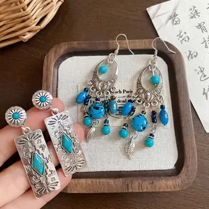 Ethnic style bohemian silver earrings with turquoise inlay and leaf tassels set