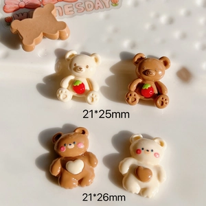 Macro shot of 21x25mm resin cartoon bear charms with strawberry and heart details