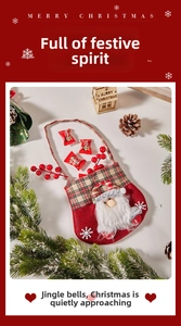 Christmas gift bag with 3D Santa Claus figure made of red velvet and plaid hat detail