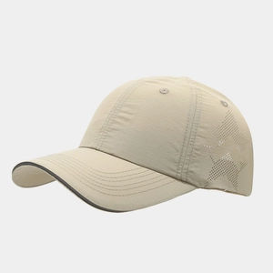 Detail of star-shaped laser cutouts and textured quick-dry fabric on the sun hat
