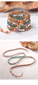 Detail of Boho wrap bracelet with tiger eye stones and colorful glass beads on leather cord