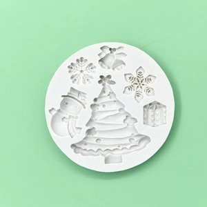 Christmas silicone mold featuring tree, snowman, and snowflake shapes for DIY baking cakes