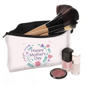 Detail of Happy Mother's Day floral printed makeup bag with brushes and cosmetics