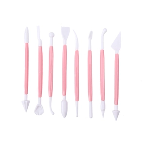 Detailed set of 8 dual-ended pink and white fondant sculpting tools for cake decorating