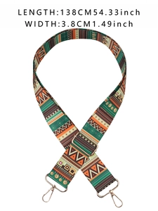 Detail view of ethnic floral adjustable replacement strap with metal swivel hooks