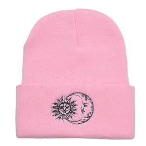 Pink knit beanie with sun and moon embroidery for outdoor winter warmth and style