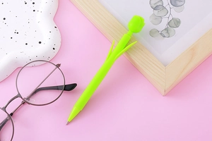 Close-up of tulip flower mechanical pencil in vibrant green on a soft pink background