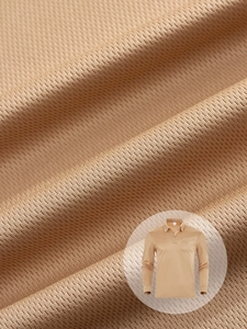 Detailed macro view of khaki breathable mesh waffle fabric texture on men's long sleeve polo