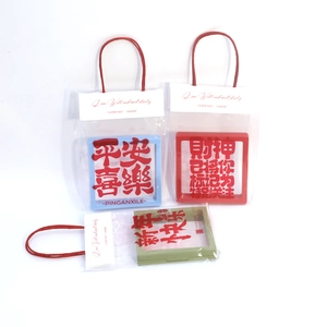 Three-color PE film jewelry display boxes with gift bags and festive New Year patterns