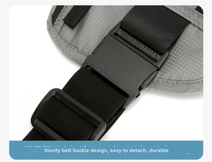 Close-up of durable plastic buckle and nylon strap on the gray ripstop sports waist bag