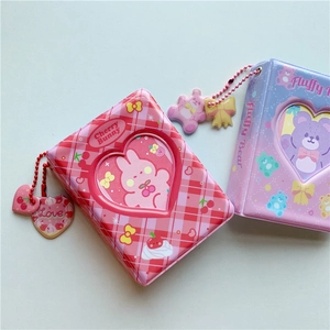 Cute 3-inch photo album featuring cherry bunny and fluffy bear patterns with heart charms