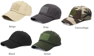 Detail of vintage distressed baseball caps with American flag patches and ripped brims