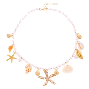 Bohemian seashell necklace with white pearls and gold starfish charms on a white background