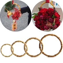 Detail of four different sized natural bamboo ring handles for DIY handbag replacement