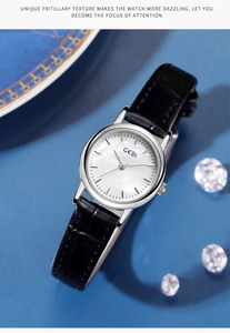 Makroaufnahme der GEDI Uhr mit weißem Perlmutt-Zifferblatt und elegantem Lederarmband