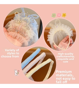 Close-up of a glittering princess crown headband with a mesh veil for little girls
