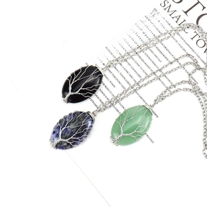Detailed wire wrapped tree of life pendants in natural agate, aventurine and sodalite stone