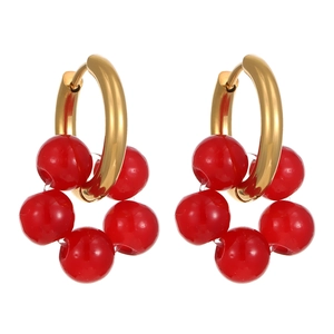 Elegant gold hoop earrings with red beaded flower clusters on a clean white background