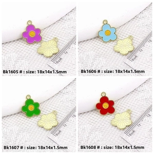 Detail view of 18x14mm colorful tulip flower charms with smile faces in four vibrant colors