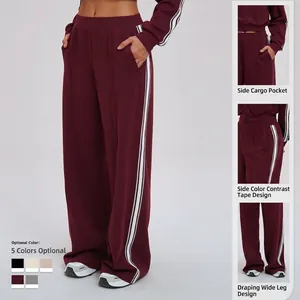 Burgundy wide-leg sweatpants with side stripes and loose fit for outdoor sports and casual wear