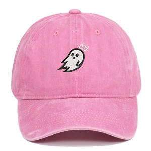 Close-up of ghost embroidery with crown on pink washed cotton baseball cap texture