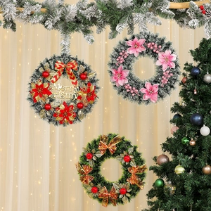 Three festive Christmas wreaths with berries, bows and Merry Christmas sign hanging on curtain