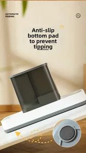 Detail of non-slip bottom pads on automatic pet feeder for stability and floor protection