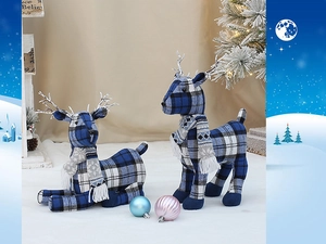 Detail of Christmas blue fabric reindeer dolls with mini scarves in festive scene