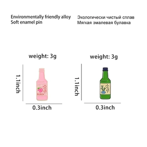 Set of two alloy soju bottle pins in pink and green with peach and fresh text
