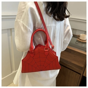 Fashionable red spider web patterned handbag with unique fan shape and shoulder strap