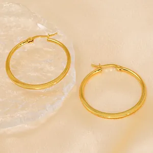 Elegant large gold hoop earrings made of stainless steel for a minimalist fashion style