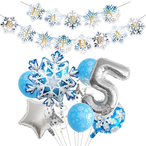 Close-up of snowflake balloons and silver number 5 for frozen themed party decorations